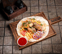 Пикантные свиные ребрышки на мангале