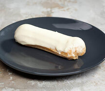 Пирожное заварное Эклер ванильный 1 шт