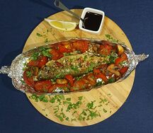 Форель, запеченная в фольге с овощами
