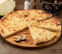 Осетинский пирог с капустой и грецким орехом