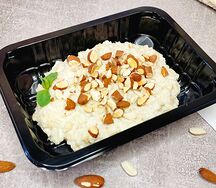 Овсяная каша на молоке с орехами большая