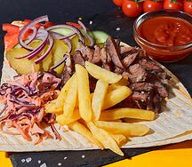 На тарелке с говядиной