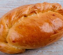 Пирожок печеный с капустой