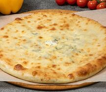 Осетинский пирог с зеленью и сыром