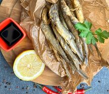 Жареная корюшка с гранатовым соусом