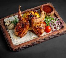 Перепелка, запечённая с дольками яблока