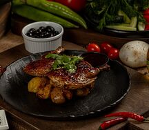 Цыпленок табака с молодым картофелем
