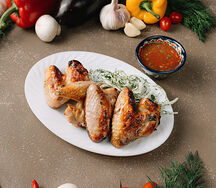 Крылышки куриные, приготовленные на углях