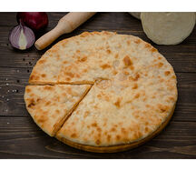 Осетинский пирог с сыром и зеленым луком