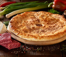 Осетинский пирог с мясом и помидорами