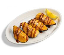 Запеченные мидии под острым соусом спайси