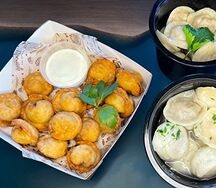 Пельмени жареные со сметаной