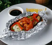 Форель запечённая с овощами