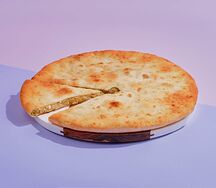 Осетинский пирог 30 см с капустой и яйцом