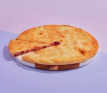 Осетинский пирог 30 см с творогом и вишней