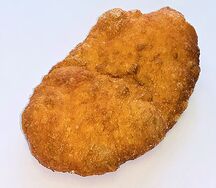 Жареный пирожок с капустой