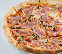 Пицца с ветчиной и грибами