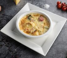 Судак, запечённый с овощами