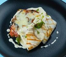 Кальмар на гриле с овощным гратеном