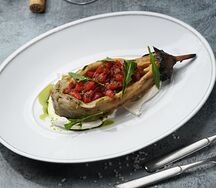 Запеченный баклажан со сливочным сыром и томатами конфи