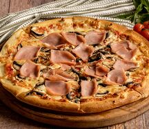 Пицца с ветчиной и грибами