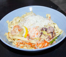 Морепродукты в сливочно-сырном соусе