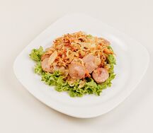 Капуста жареная с сосисками 