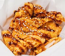 Стрипсы куриные в соусе терияки