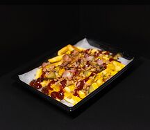 Картофель с беконом в сырном соусе