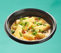 Токпокки с курицей в сырном соусе