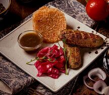 Люля-кебаб из курицы с гурийской капустой