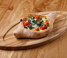 Хачапури с лососем, яйцом пашот и мятной аджикой