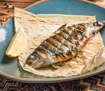 Форель, фаршированная зеленью