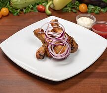 Куриная голень на углях