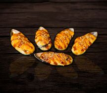 Мидии, запеченные под сырным соусом