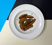 Картофельные дольки с травами