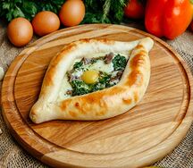 Хачапури по-аджарски с домашней бужениной и шпинатом