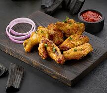 Куриные крылышки на углях