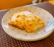 Отбивная из свинины под сырной шапочкой