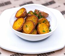 Молодой обжаренный картофель