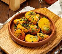 Жареный картофель бэби с чесноком и зеленью