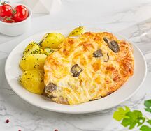 Грудка куриная с грибами и гарниром