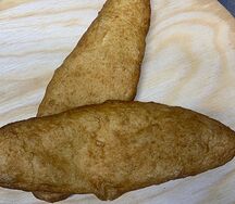 Жареный пирожок с капустой