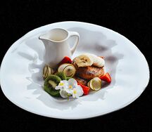 Сырники на топленом молоке с соусом из маракуйи