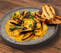 Ассорти морепродуктов в сливочном унаги