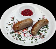 Колбаски жареные свиные