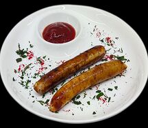 Колбаски жареные куриные