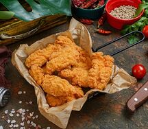 Стрипсы куриные в панировке большие