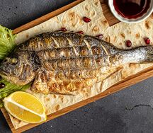 Дорадо на мангале