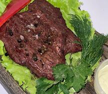 Стейк говяжий на углях